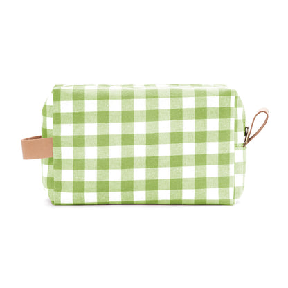 Neceser verde con estampado vichy, práctico y lleno de frescura.