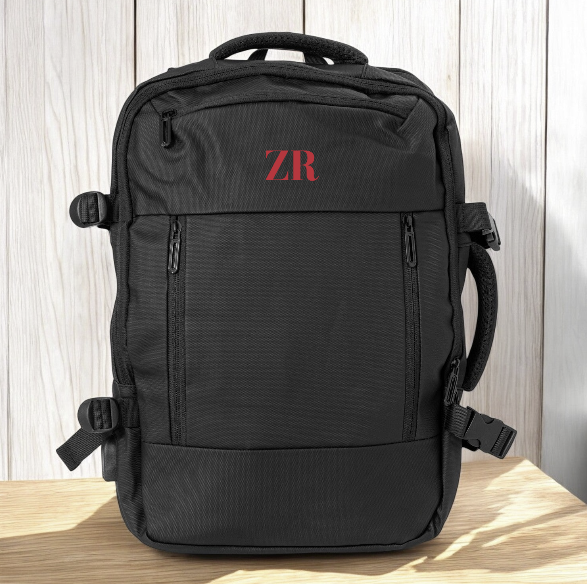 Mochila con puerto USB y compartimentos amplios para portátil

